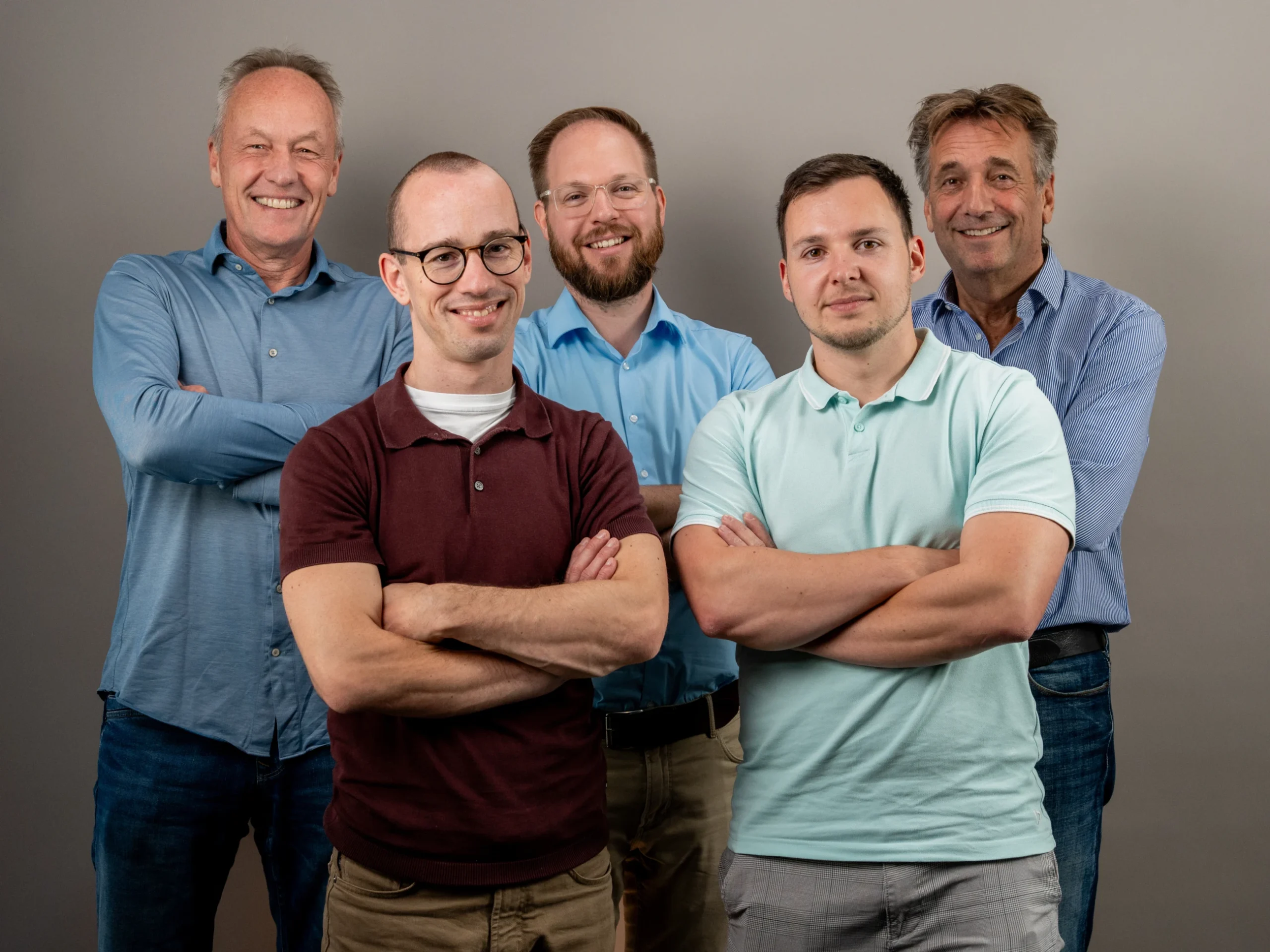 Groepsfoto van het managementteam van Wolfpack